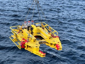 Chop saw for decommissioning being lowered into the water